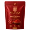 Hilvera Natural Essentials Red Chilli Powder 100g stand-up zipper pouch displayed against a plain white background. Hilvera Pure Red Chilli Powder