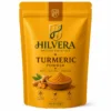 Hilvera Natural Essentials pure turmeric powder 100g stand-up zipper pouch shown on a clean white background.