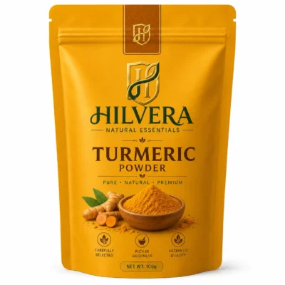 Hilvera Natural Essentials pure turmeric powder 100g stand-up zipper pouch shown on a clean white background.