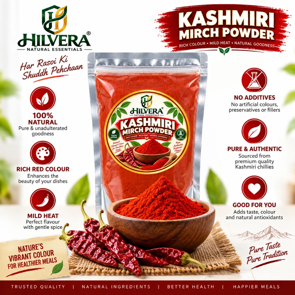 Hilvera Kashmiri Mirch Powder pouch with heap of red chilli powder in wooden bowl and whole dried red chillies