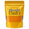 Kathait Gold Turmeric Powder pack in premium gold packaging with haldi powder visible through the transparent pouch .Kathait Gold Pure Turmeric Powder