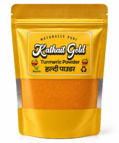 Kathait Gold Turmeric Powder pack in premium gold packaging with haldi powder visible through the transparent pouch .Kathait Gold Pure Turmeric Powder